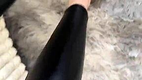 Barefoot girl in leather skirt on Friday