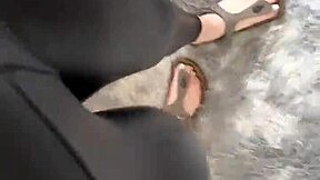 Barefoot girl in leather skirt on Friday