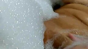 masturbating in motel bathtub, cumming on big dildo?