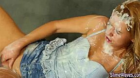 Toy fucked bukkake blonde in gloryhole facial.