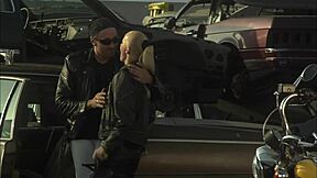 Crazy passionate fuck unfolds at the abandoned car scrapyard