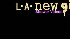 Elegant dark-haired beauty enjoys a relaxing shower