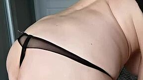 i admire this black net dress with high heels and close up view