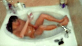 solo bubble bathing boy in the bathroom