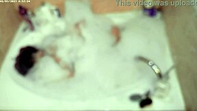 solo bubble bathing boy in the bathroom