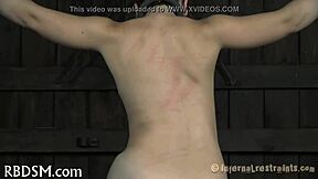 Whipping session explores sadomasochism dynamics.