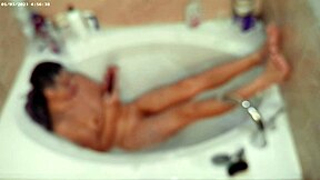 solo bubble bathing boy in the bathroom