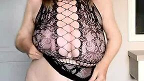 i admire this black net dress with high heels and close up view