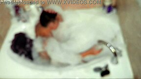 solo bubble bathing boy in the bathroom