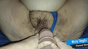 Fat slut endures fisting fucking and squirting climax.