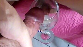 Bold massage session ends with cum in cup.