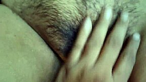 Desi bhabi meticulously cleans her hairy pussy.