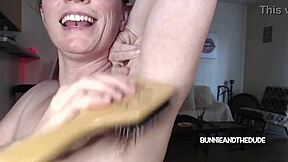 Bunnie explores musky natural armpits with hairbrush