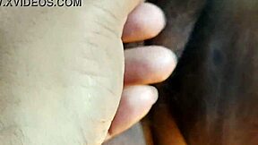 Desi bhabi meticulously cleans her hairy pussy.