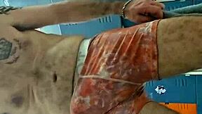 guy masturbates his big cock in the gym bathroom solo