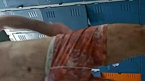 guy masturbates his big cock in the gym bathroom solo