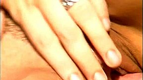 a mature man meets an exotic babe wearing only a cap and sunglasses on the seaside stones