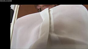 Naughty granny in see-through top and slip teasing and flashing