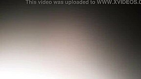 The blonde Latina in a pink blouse models while licking and sucking