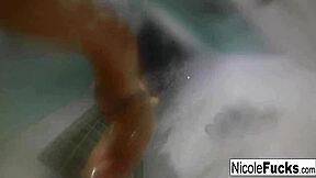 Hot pornstar Nicole Aniston enjoys a long steamy shower solo.
