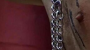 nipple treatment for slave with clamps and wax ending with water