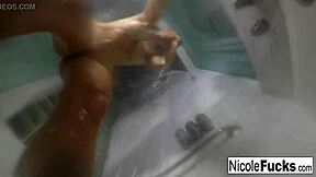 Hot pornstar Nicole Aniston enjoys a long steamy shower solo.