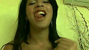 Foxy brunette tranny tugging hard cock!