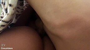 A couple shares a romantic good morning kiss early in the day