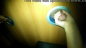 Husband records his wife enjoying a lively social gathering at a swing party, where she engages with strangers at the glory hole.