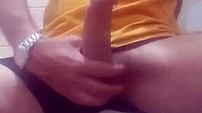 A guy masturbates and cums in the bathroom