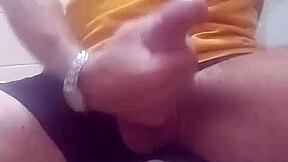 A guy masturbates and cums in the bathroom