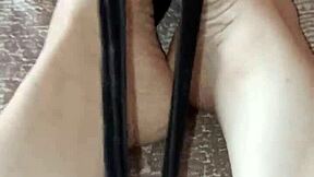 Gretala Rubs Thong on Her Bare Feet in Sensual Display