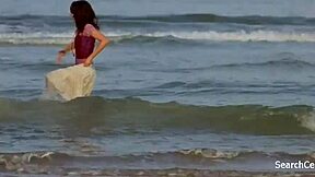 Mila Kunis participates in the kissing and licking scene in Moving McAllister