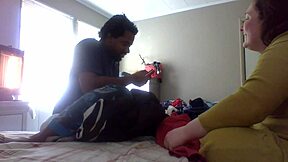 Wife teaches folding clothes with big natural tits.