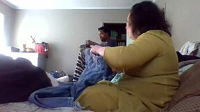 Wife teaches folding clothes with big natural tits.