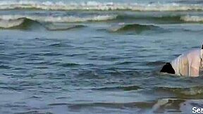 Mila Kunis participates in the kissing and licking scene in Moving McAllister