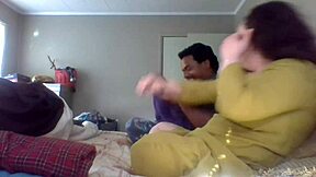 Wife teaches folding clothes with big natural tits.