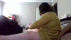 Wife teaches folding clothes with big natural tits.