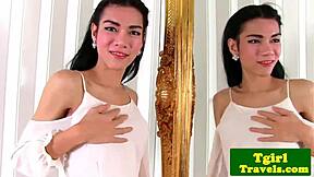 busty ladyboy mia jerks her cock while looking in the mirror