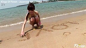 skinny japanese chick enjoys photoshoot on the beach