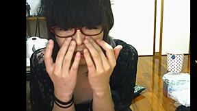 Intense Japanese shemale indulges in vigorous solo masturbation with explicit self-touching and climactic release