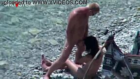 Watch this slut wife blow and fuck on the beach? Public voyeur action.