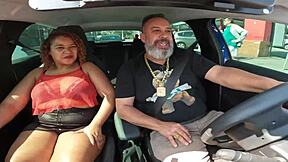 Emily Leoa sits with giant ass on street