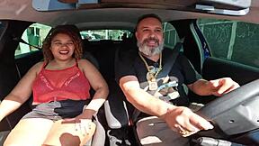 Emily Leoa sits with giant ass on street