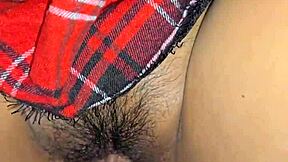 The mature latina housewife models her outfit at home