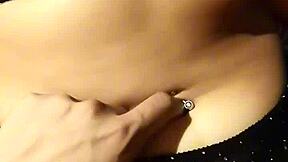 Relaxing with her belly button in a soothing couple session