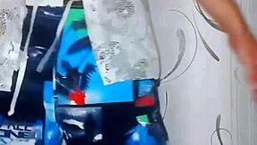 big chocolate cuck spins to music in striptease