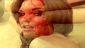 Am an experienced woman with brown hair getting her pussy opened