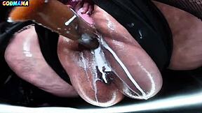 Your horny mature godmama stretches her hairy wet cunt with dildo in garage