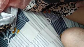 Horny desi girl gives footjob while using vibrator on bed